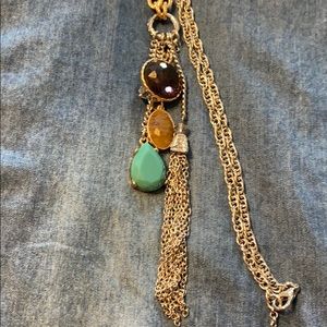 Long necklace with tassel and hanging stones